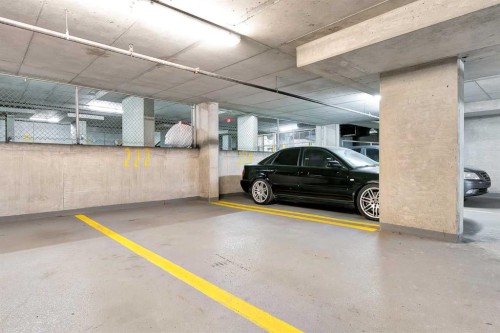 716-1111 6 Avenue Sw, Calgary, AB - Indoor Photo Showing Garage