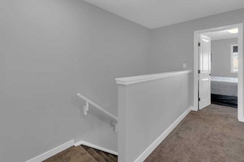 317 Sundown Road South, Cochrane, AB - Indoor Photo Showing Other Room