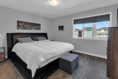317 Sundown Road South, Cochrane, AB - Indoor Photo Showing Bedroom