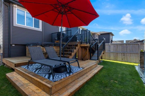 317 Sundown Road South, Cochrane, AB - Outdoor With Deck Patio Veranda With Exterior