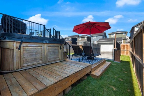 317 Sundown Road South, Cochrane, AB - Outdoor With Deck Patio Veranda With Exterior