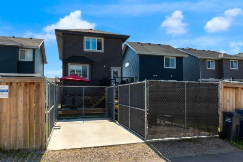 317 Sundown Road South, Cochrane, AB - Outdoor With Exterior