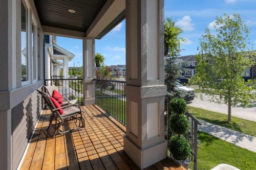 317 Sundown Road South, Cochrane, AB - Outdoor With Deck Patio Veranda With Exterior