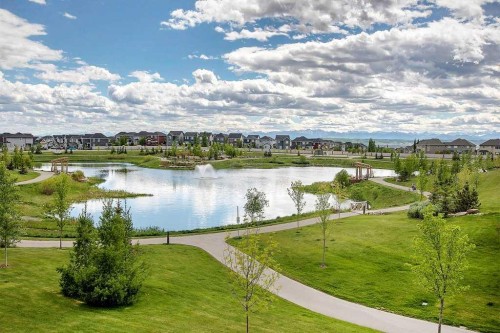 317 Sundown Road South, Cochrane, AB - Outdoor With Body Of Water With View