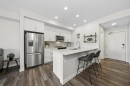 224-255 Les Jardins Park Se, Calgary, AB  - Indoor Photo Showing Kitchen With Stainless Steel Kitchen With Double Sink With Upgraded Kitchen 