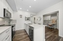 224-255 Les Jardins Park Se, Calgary, AB  - Indoor Photo Showing Kitchen With Double Sink With Upgraded Kitchen 