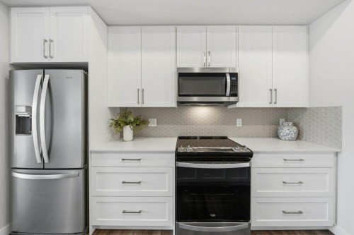 224-255 Les Jardins Park Se, Calgary, AB - Indoor Photo Showing Kitchen With Stainless Steel Kitchen With Upgraded Kitchen