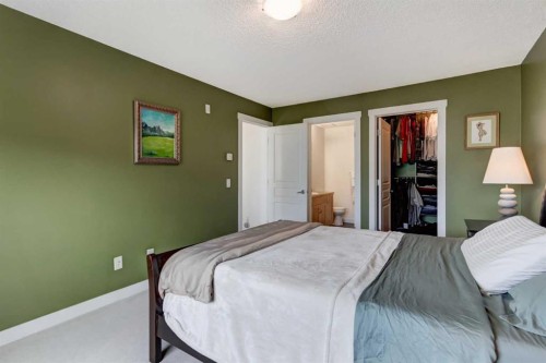1222-211 Aspen Stone Boulevard Sw, Calgary, AB - Indoor Photo Showing Bedroom