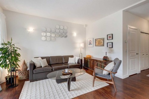 1222-211 Aspen Stone Boulevard Sw, Calgary, AB - Indoor Photo Showing Living Room