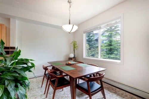 1222-211 Aspen Stone Boulevard Sw, Calgary, AB - Indoor Photo Showing Dining Room