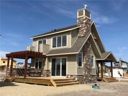 301 Cottageclub Green  Rural Rocky View County, AB T4C 1B1