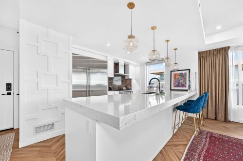 701-8445 Broadcast Avenue Sw, Calgary, AB - Indoor Photo Showing Kitchen With Upgraded Kitchen