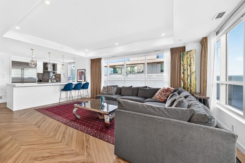 701-8445 Broadcast Avenue Sw, Calgary, AB - Indoor Photo Showing Living Room
