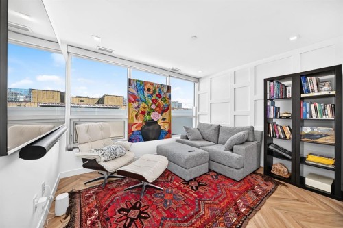 701-8445 Broadcast Avenue Sw, Calgary, AB - Indoor Photo Showing Living Room