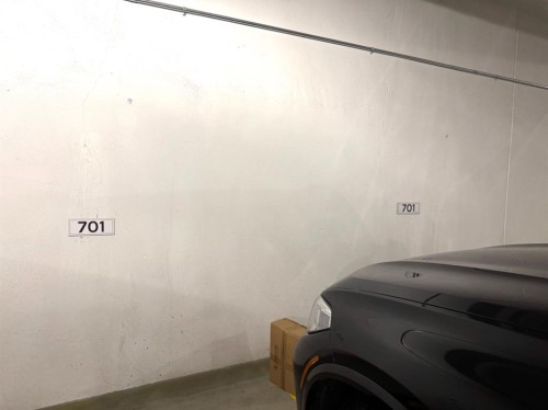 701-8445 Broadcast Avenue Sw, Calgary, AB - Indoor Photo Showing Garage