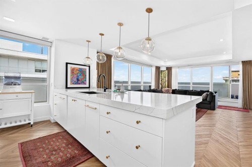 701-8445 Broadcast Avenue Sw, Calgary, AB - Indoor Photo Showing Kitchen With Upgraded Kitchen