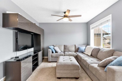106 Morningside Circle Sw, Airdrie, AB - Indoor Photo Showing Living Room