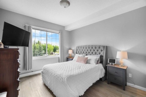 220-8 Prestwick Pond Terrace Se, Calgary, AB - Indoor Photo Showing Bedroom
