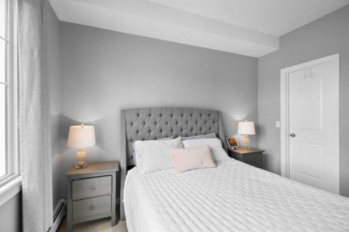 220-8 Prestwick Pond Terrace Se, Calgary, AB - Indoor Photo Showing Bedroom