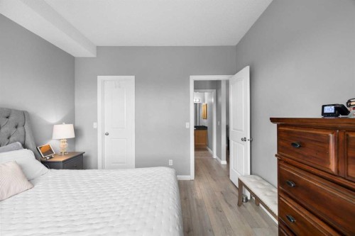 220-8 Prestwick Pond Terrace Se, Calgary, AB - Indoor Photo Showing Bedroom