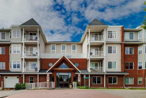 220-8 Prestwick Pond Terrace Se, Calgary, AB - Outdoor With Balcony With Facade