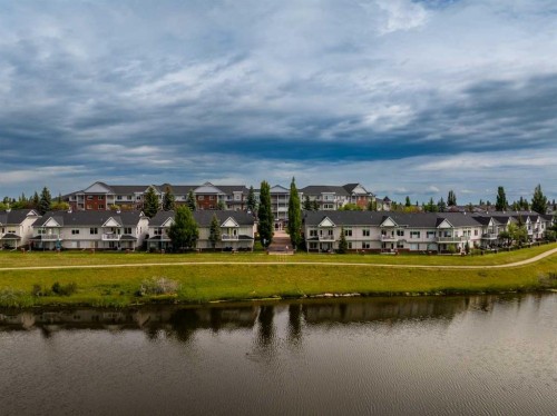 220-8 Prestwick Pond Terrace Se, Calgary, AB - Outdoor With Body Of Water With View