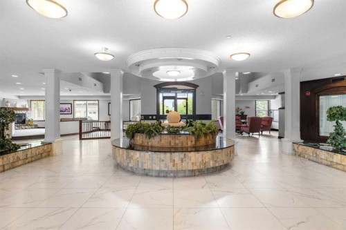 220-8 Prestwick Pond Terrace Se, Calgary, AB - Indoor Photo Showing Other Room