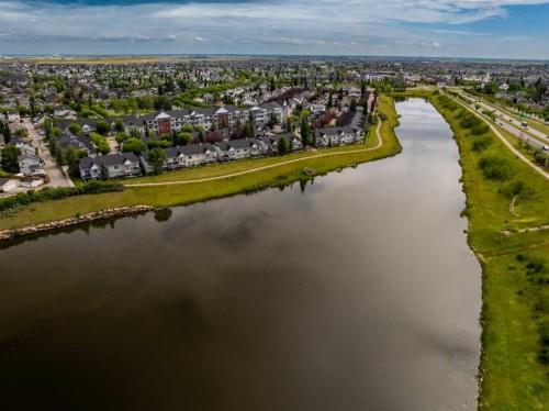 220-8 Prestwick Pond Terrace Se, Calgary, AB - Outdoor With Body Of Water With View