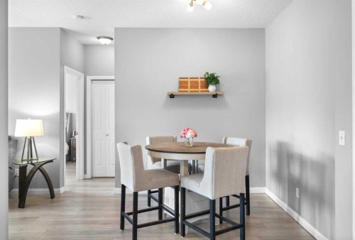220-8 Prestwick Pond Terrace Se, Calgary, AB - Indoor Photo Showing Dining Room
