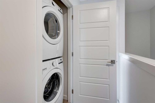 7369 Mercado Avenue Se, Calgary, AB - Indoor Photo Showing Laundry Room