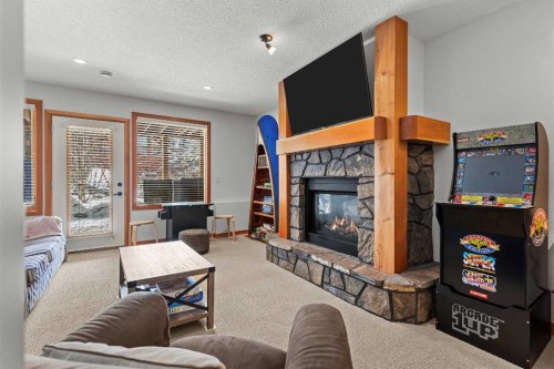 634 4 Street, Canmore, AB - Indoor Photo Showing Living Room With Fireplace