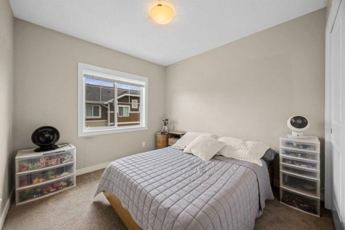 121-300 Marina Drive, Chestermere, AB - Indoor Photo Showing Bedroom