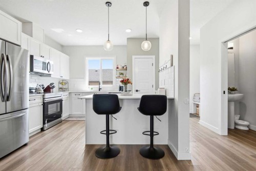 23 Sienna Boulevard, Fort Saskatchewan, AB - Indoor Photo Showing Kitchen With Stainless Steel Kitchen With Upgraded Kitchen