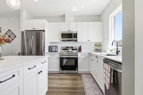 23 Sienna Boulevard, Fort Saskatchewan, AB - Indoor Photo Showing Kitchen With Stainless Steel Kitchen With Upgraded Kitchen