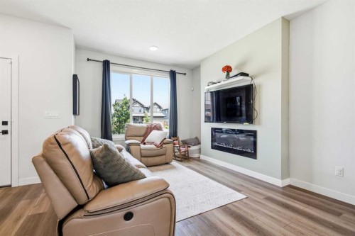 23 Sienna Boulevard, Fort Saskatchewan, AB - Indoor Photo Showing Living Room With Fireplace