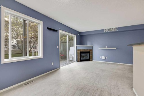 155 Citadel Meadow Gardens Nw, Calgary, AB - Indoor With Fireplace