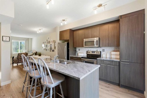 43-300 Marina Drive, Chestermere, AB - Indoor Photo Showing Kitchen With Double Sink
