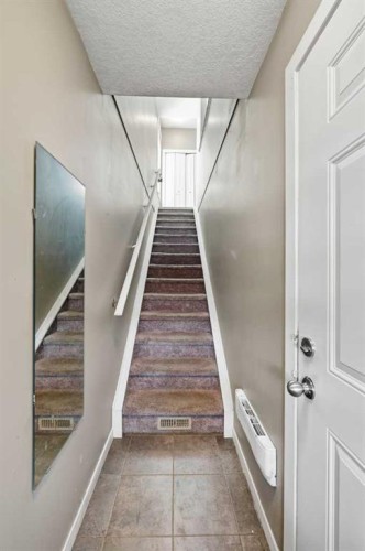 28 New Brighton Point Se, Calgary, AB - Indoor Photo Showing Other Room