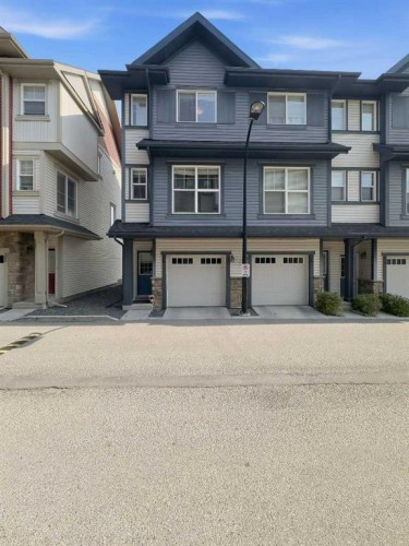 28 New Brighton Point Se, Calgary, AB - Outdoor With Facade