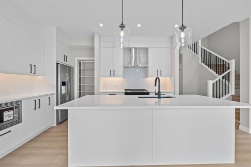 129 Walgrove Bay Se, Calgary, AB - Indoor Photo Showing Kitchen With Upgraded Kitchen