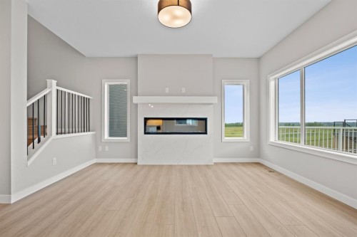129 Walgrove Bay Se, Calgary, AB - Indoor With Fireplace
