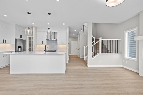 129 Walgrove Bay Se, Calgary, AB - Indoor Photo Showing Kitchen With Upgraded Kitchen