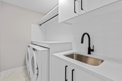 129 Walgrove Bay Se, Calgary, AB - Indoor Photo Showing Laundry Room