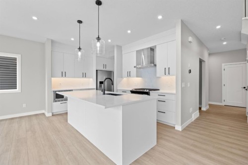 129 Walgrove Bay Se, Calgary, AB - Indoor Photo Showing Kitchen With Upgraded Kitchen