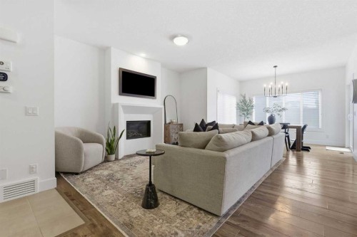 234 Mahogany Passage Se, Calgary, AB - Indoor Photo Showing Living Room With Fireplace