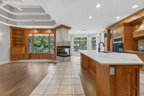 52 Sandstone Ridge Crescent, Okotoks, AB - Indoor With Fireplace