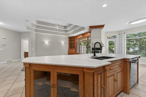 52 Sandstone Ridge Crescent, Okotoks, AB - Indoor Photo Showing Kitchen With Double Sink