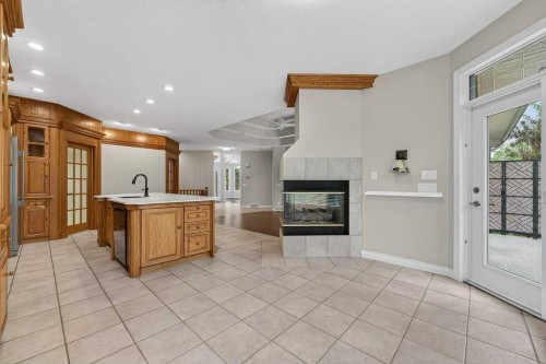 52 Sandstone Ridge Crescent, Okotoks, AB - Indoor With Fireplace