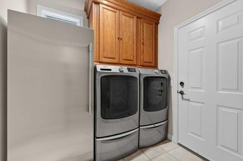 52 Sandstone Ridge Crescent, Okotoks, AB - Indoor Photo Showing Laundry Room
