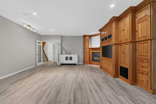 52 Sandstone Ridge Crescent, Okotoks, AB - Indoor With Fireplace
